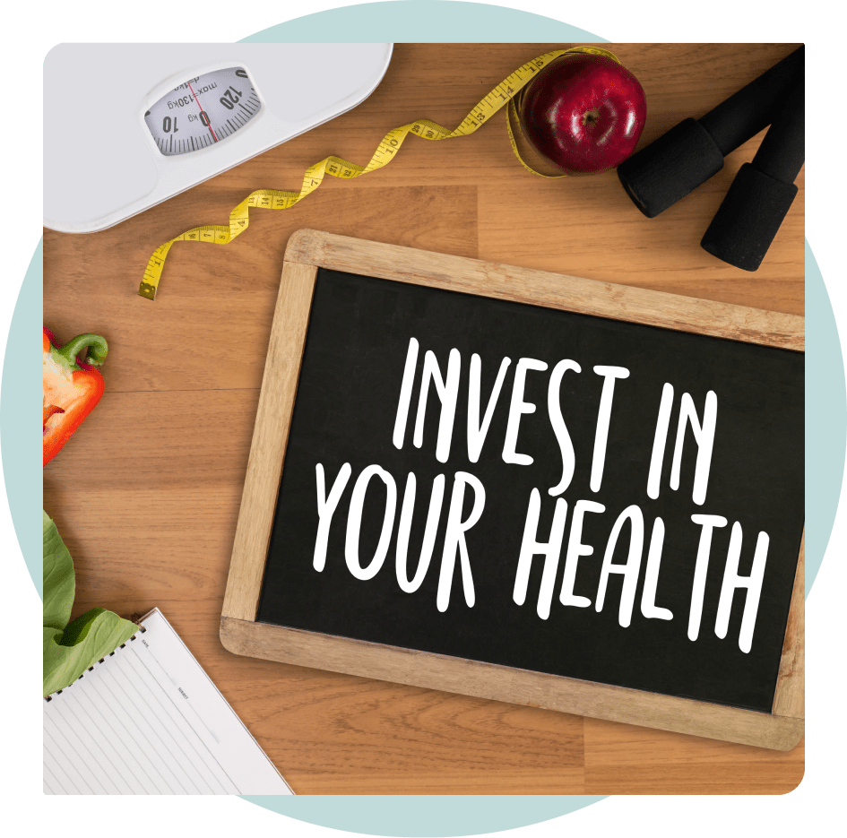 A board that says Invest In Your Health